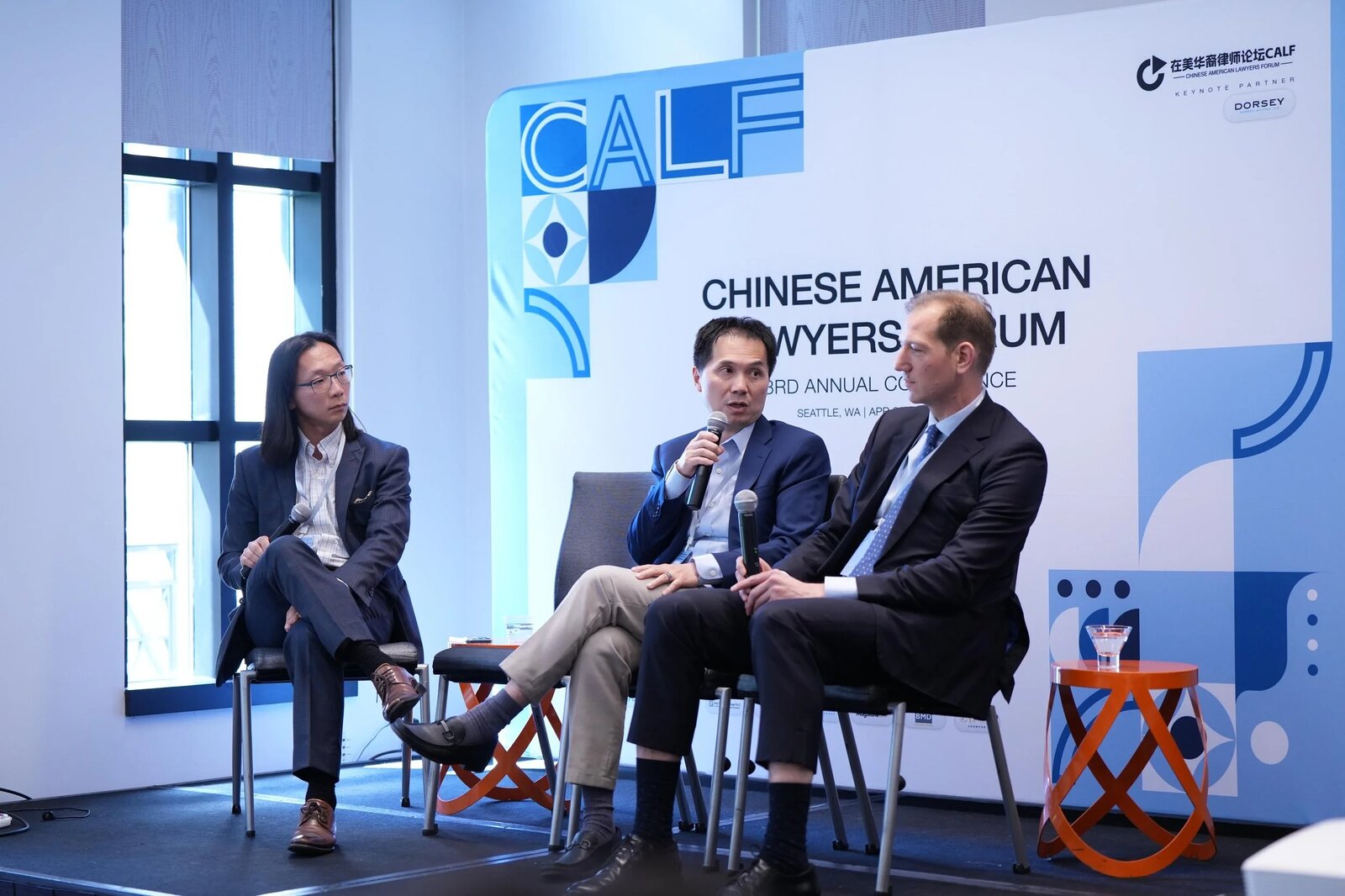 Angus Ni speaking on a panel at the Chinese American Lawyers Forum in Seattle